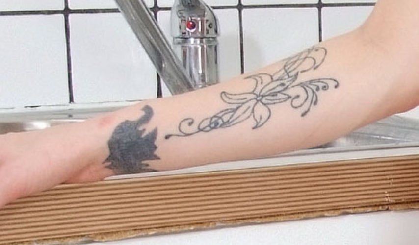 Tattoo on right arm