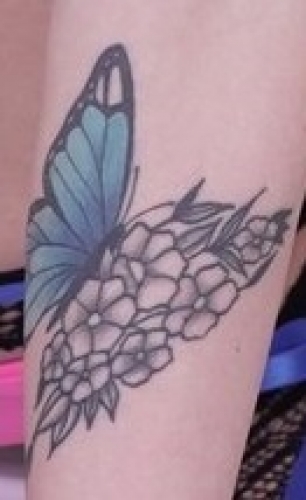 Butterfly on left arm