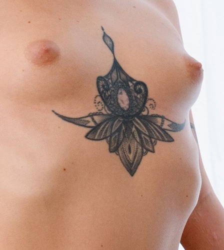 Tattoo between boobs